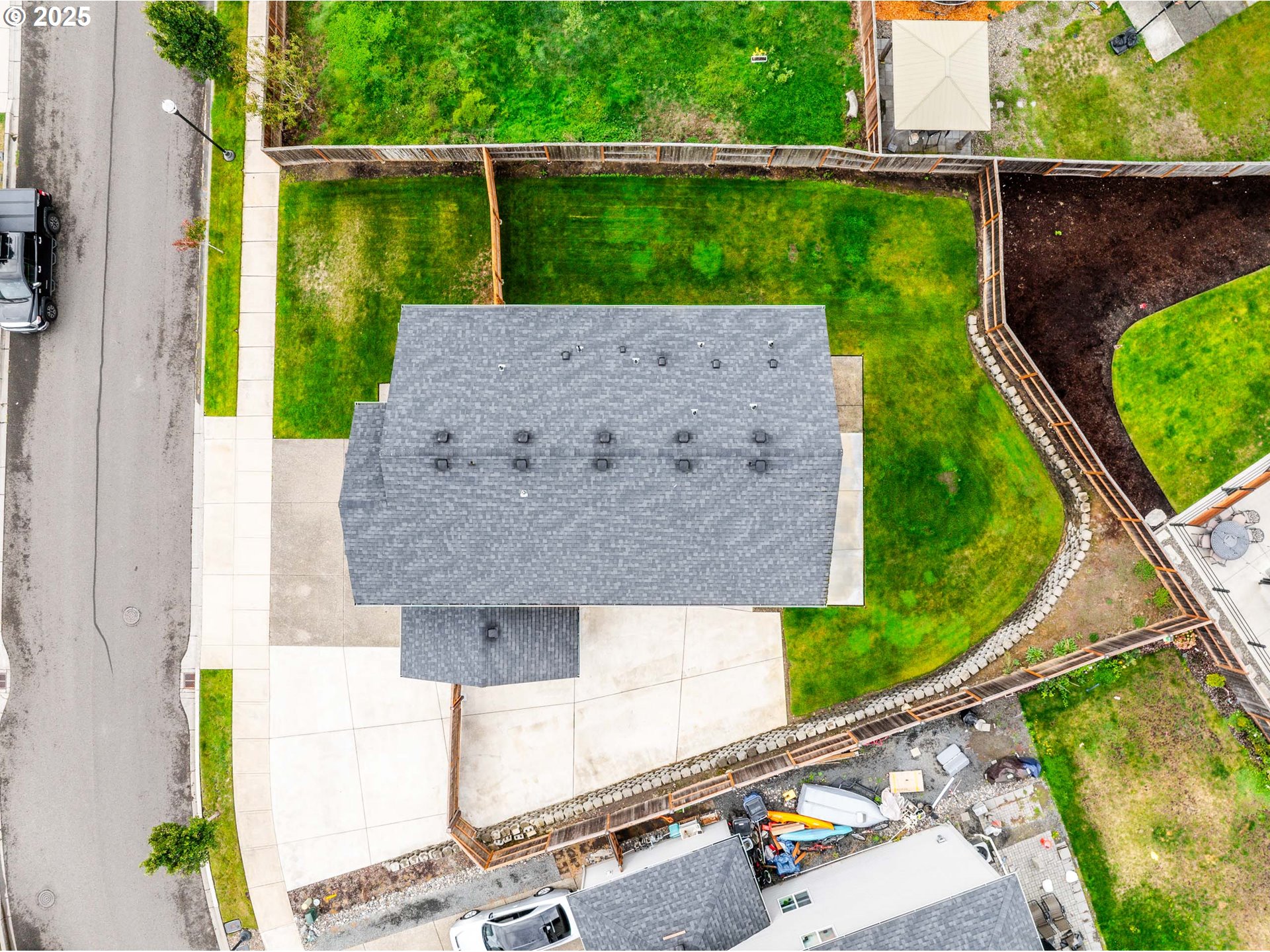2777 South Red Tail Loop Ridgefield, WA 98642 - Photo 35 of 37 an aerial view of a house with a yard and a garden