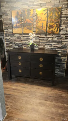 a view of entryway with wooden floor