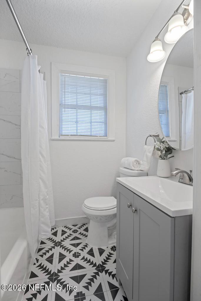 9735 Nimitz Court South Jacksonville, FL 32246 - Photo 11 of 33 Hall Bathroom