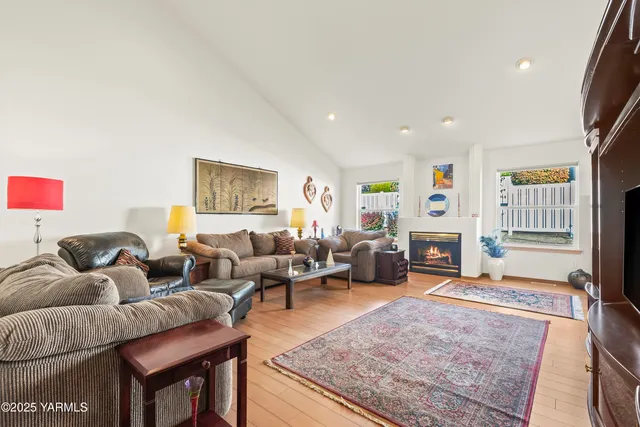 a living room with furniture or couch and a fireplace