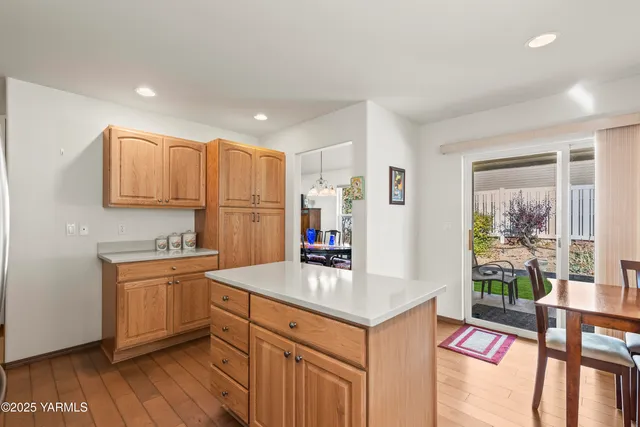 a kitchen with a sink stove and refrigerator