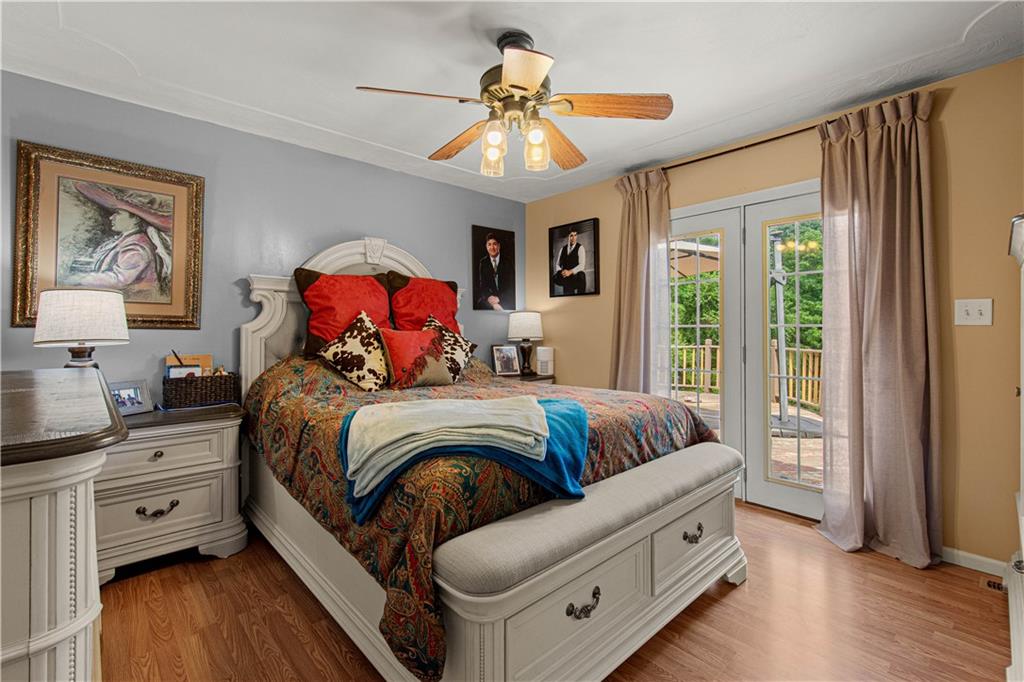 3054 Bedillion Road Washington, PA 15301 - Photo 21 of 47 Spacious primary suite with direct access to the outdoor deck.