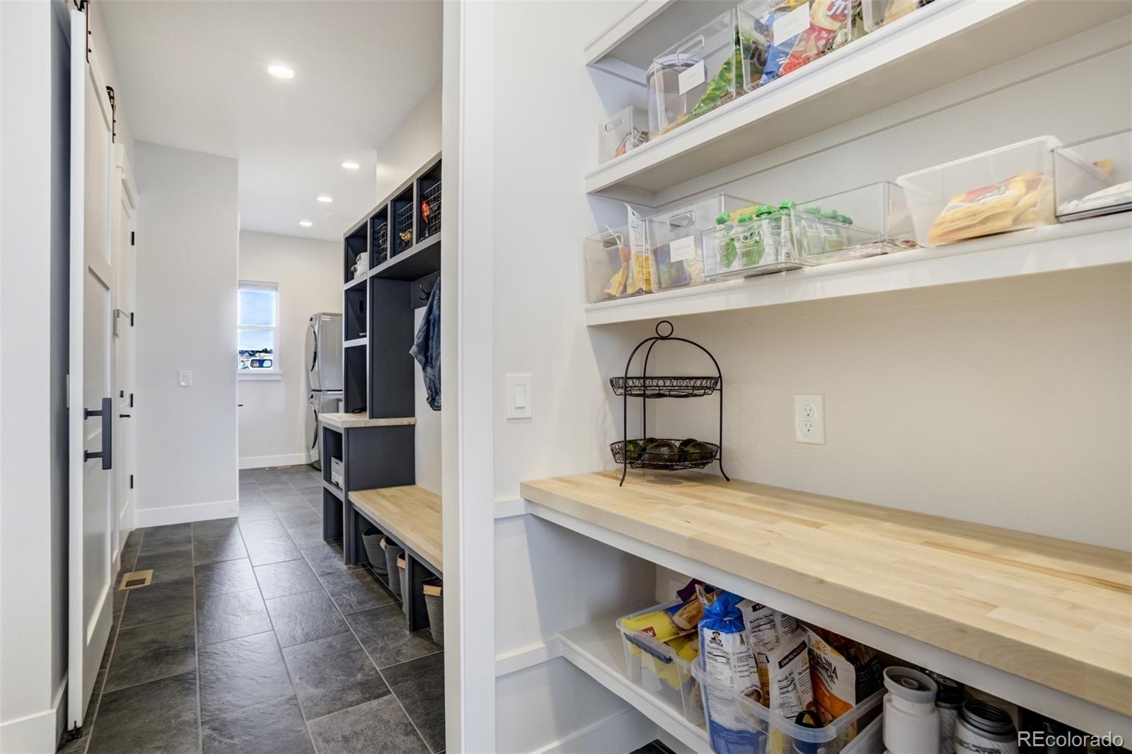 1287 Kelso Place Colorado Springs, CO 80921 - Photo 15 of 50 a room with storage and utility