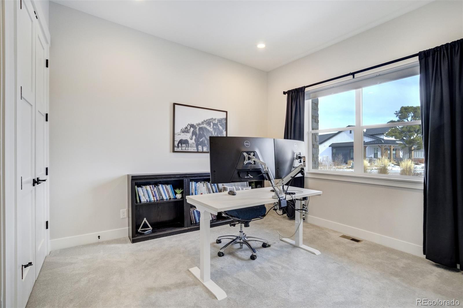 1287 Kelso Place Colorado Springs, CO 80921 - Photo 20 of 50 a workspace with furniture and window