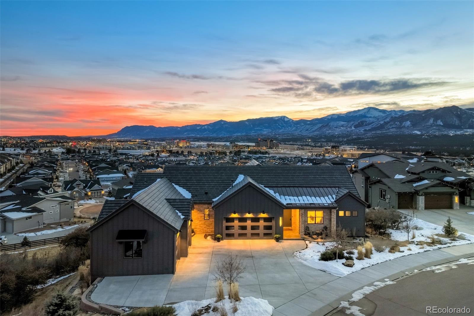 1287 Kelso Place Colorado Springs, CO 80921 - Photo 2 of 50 a view of a street with a cars parked in front of it