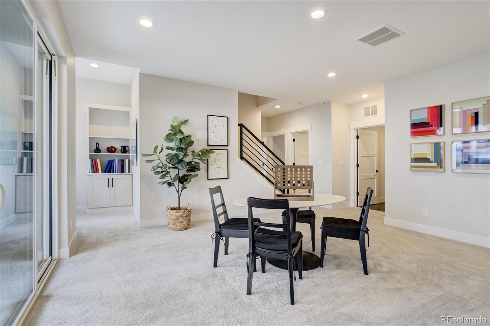 1287 Kelso Place Colorado Springs, CO 80921 - Photo 23 of 50 a dining room with furniture and entryway
