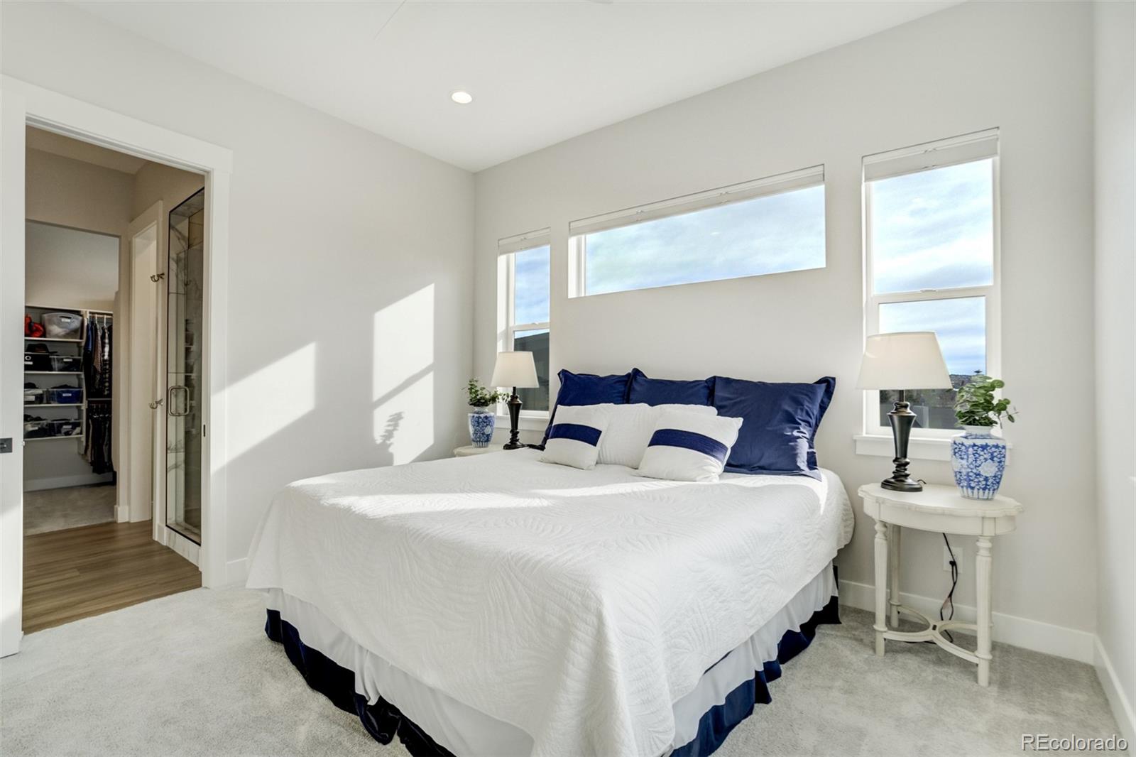 1287 Kelso Place Colorado Springs, CO 80921 - Photo 40 of 50 a bedroom with a bed and a dresser