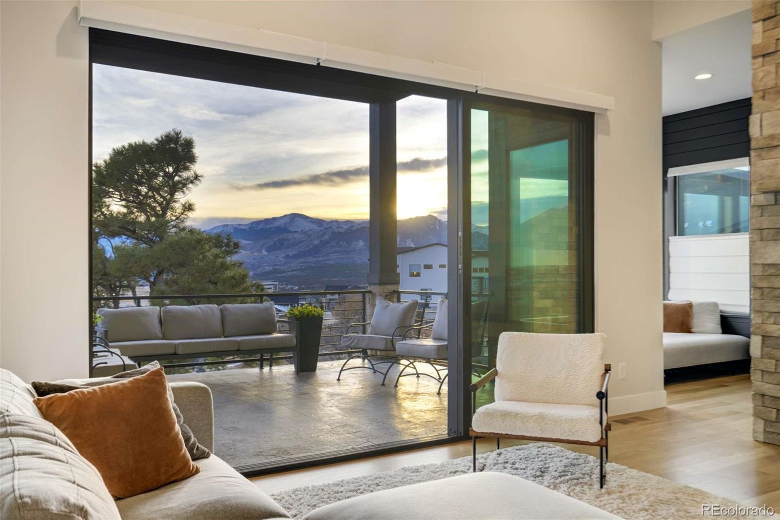 1287 Kelso Place Colorado Springs, CO 80921 - Photo 4 of 50 a living room with furniture and a large window