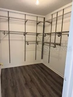 a view of a room with racks on the wall