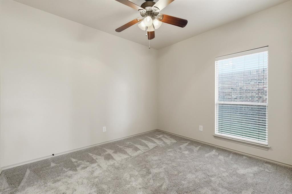 3228 Buckthorn Lane Argyle, TX 76226 - Photo 7 of 21 a view of an empty room with a window