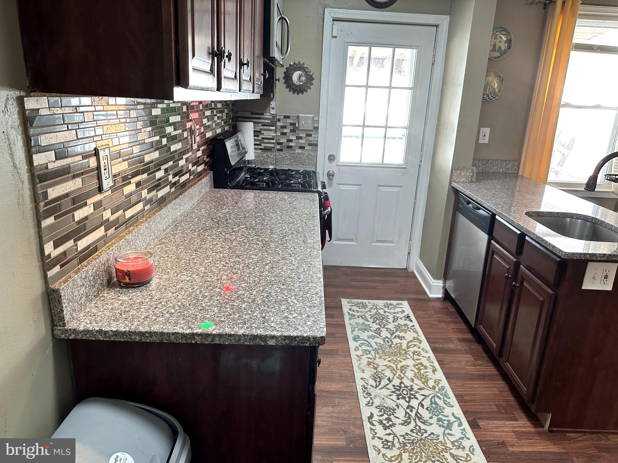 1608 Manor Road Dundalk, MD 21222 - Photo 7 of 22 alt view of kitchen with door to go out