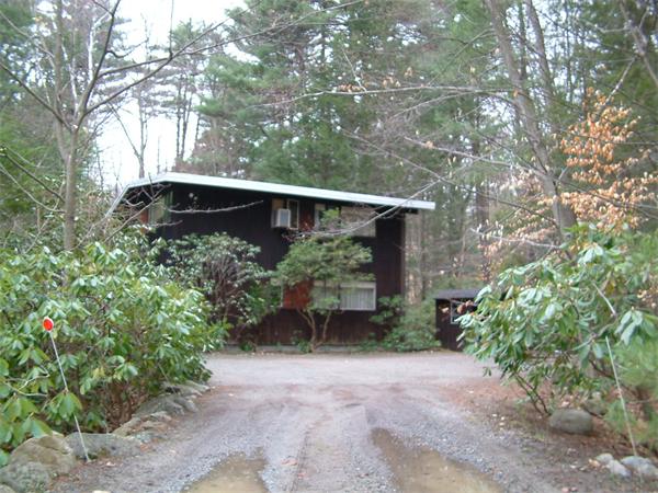 52 Turning Mill Road Lexington, MA 02420 - Photo 1 of 1 a backyard of a house with lots of green space