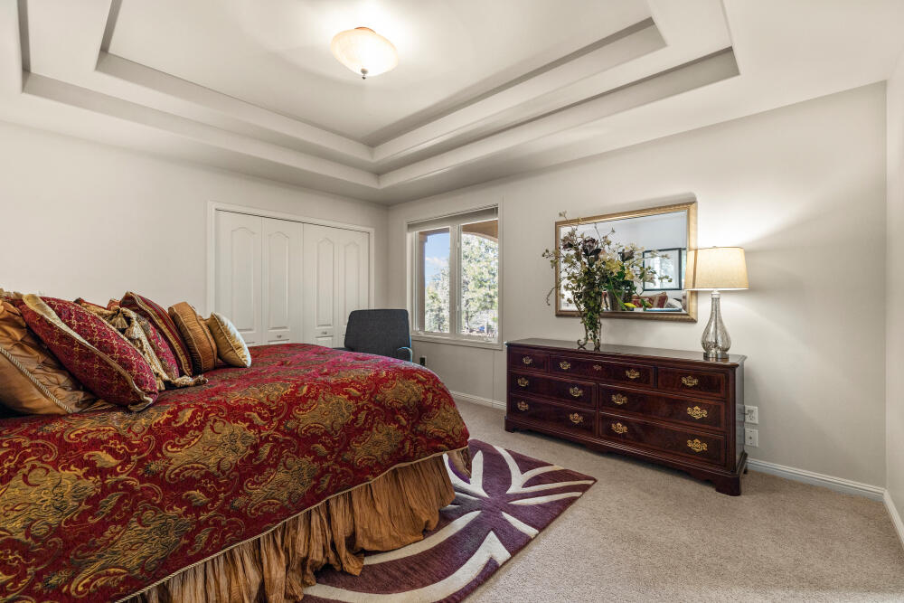 11629 Merganser Road Klamath Falls, OR 97601 - Photo 27 of 50 a bed room with a bed and a dresser