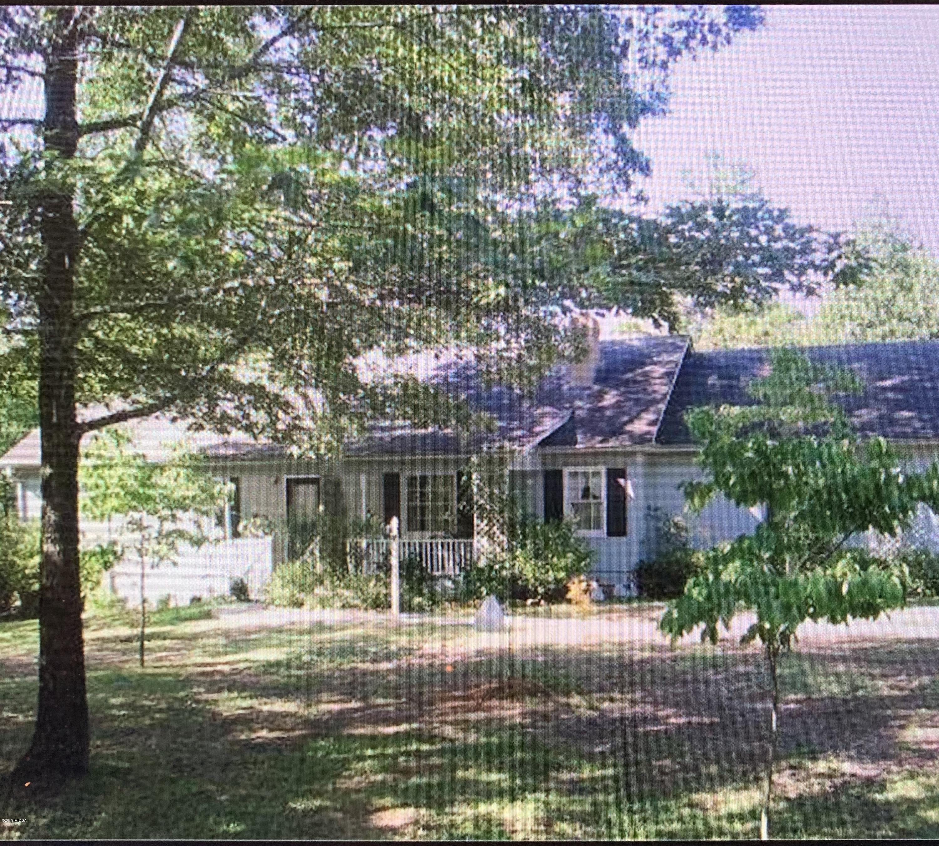 571 Taylor Road Juliette, GA 31046 - Photo 1 of 1 a front view of house with yard and green space