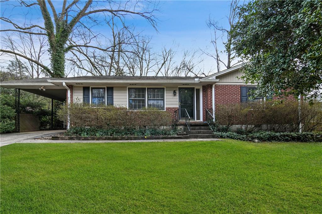 2643 Harrington Drive Decatur, GA 30033 - Photo 1 of 1 a front view of house with yard and green space