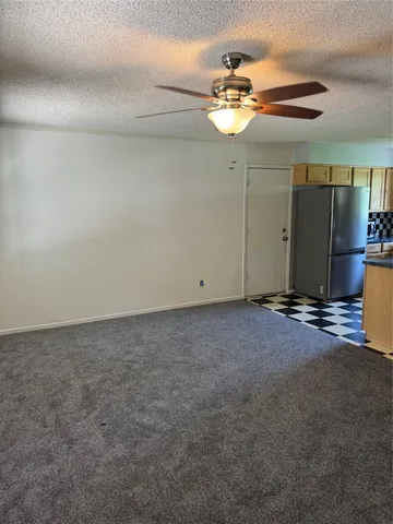 a view of a room with a fan