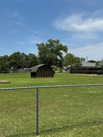 a view of a golf course with a lake