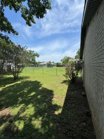 a view of a lake with a big yard