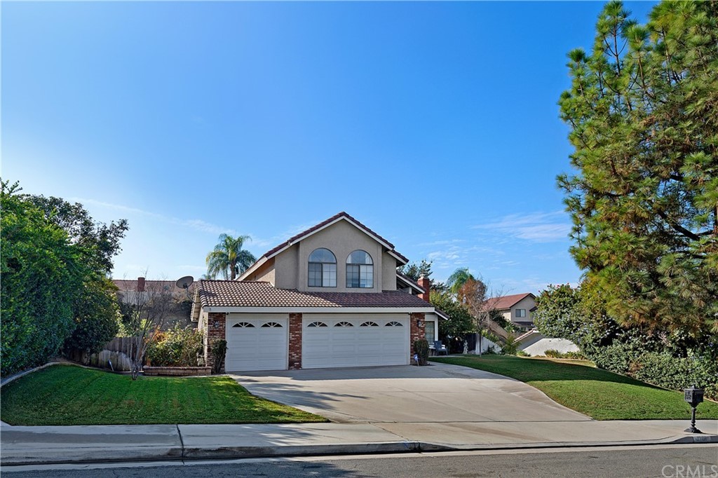 1288 Shakespeare Drive Riverside, CA 92506 - Photo 1 of 1 a view of a house with a yard
