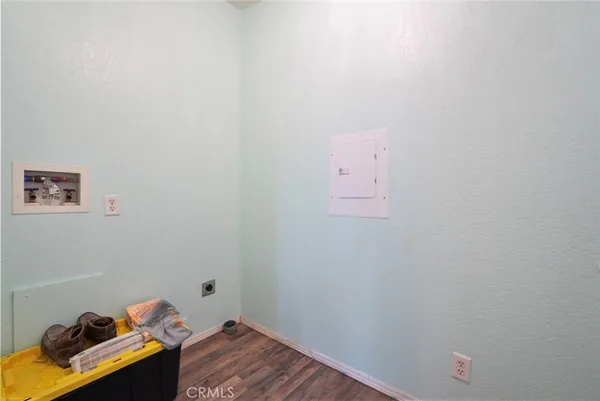 a room with toys and wooden floor
