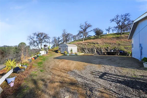 a view of a yard with an outdoor space