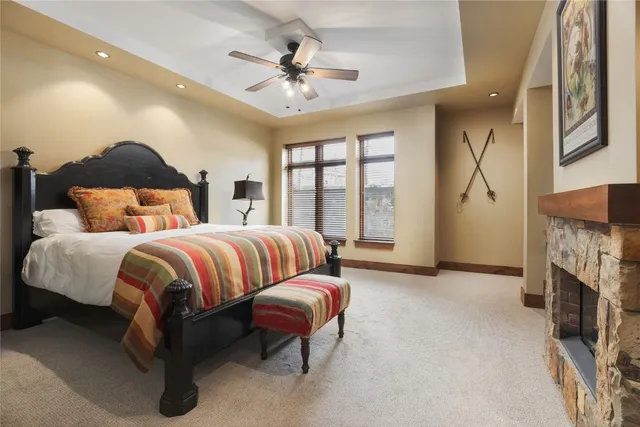 a bedroom with a bed and dresser