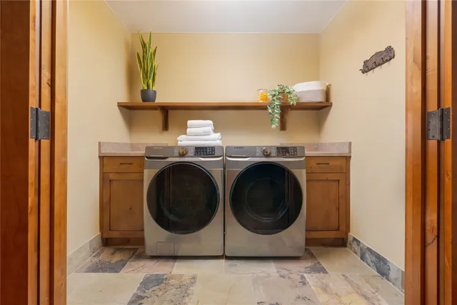 a bedroom with a bed and dresser