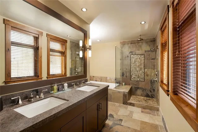 a bedroom with two beds and a closet