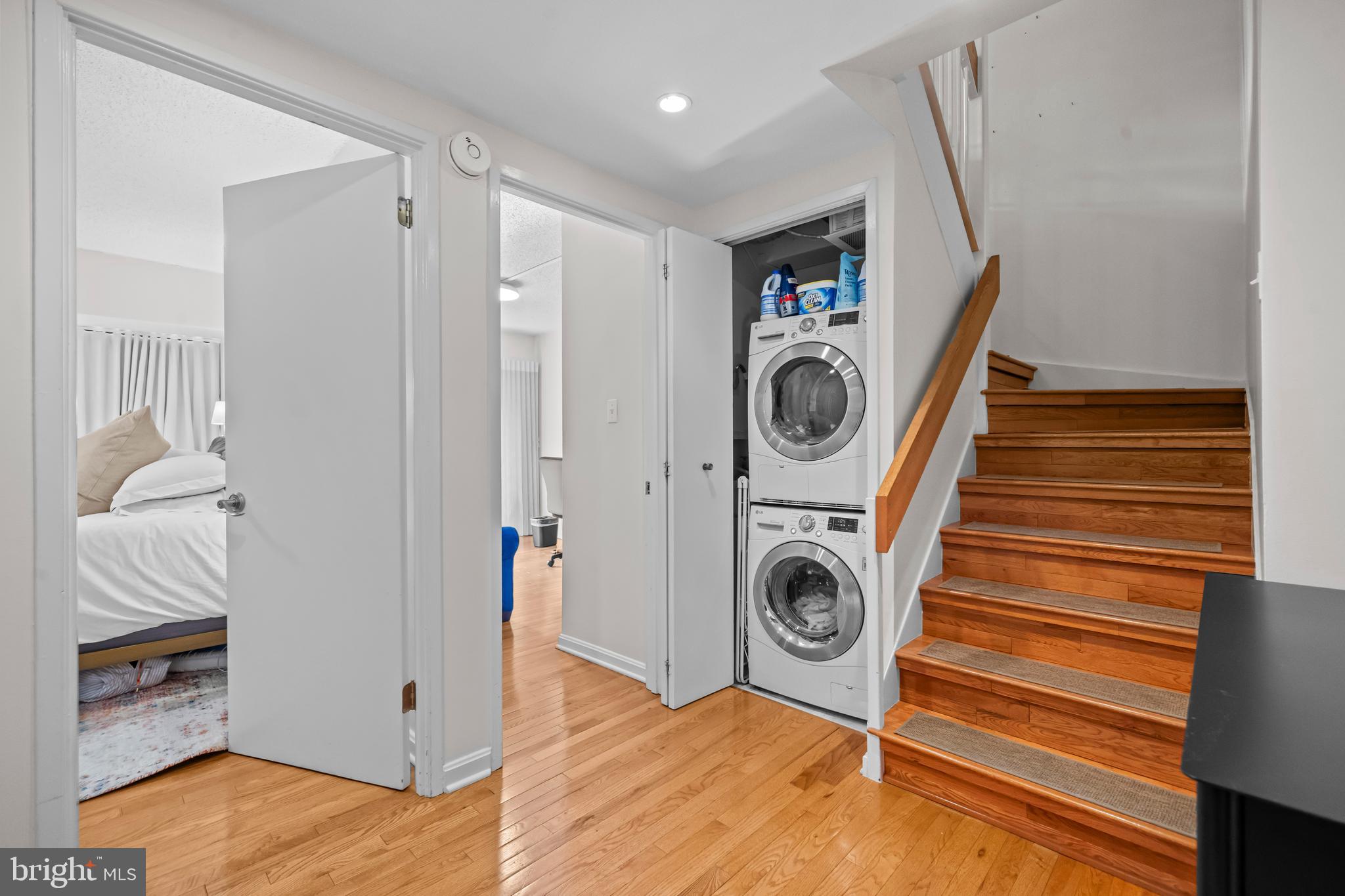 3225 Grace Street Northwest, Unit 219 Washington, DC 20007 - Photo 23 of 45 a view of a hallway with washer and dryer