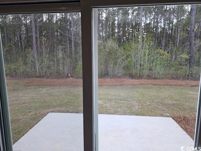 454 Ladyfish Loop Northwest Sunset Beach, NC 28468 - Photo 3 of 17 View of yard featuring a patio area