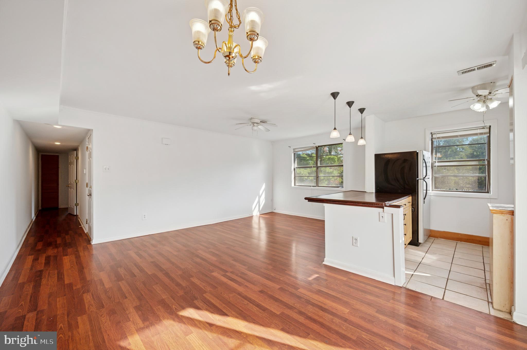710 Willow Street, Unit B Lansdale, PA 19446 - Photo 6 of 25 a view of a livingroom with wooden floor