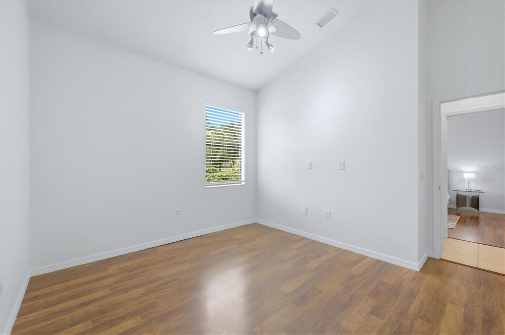 428 Snapdragon Loop Bradenton, FL 34212 - Photo 22 of 33 an empty room with windows and closet