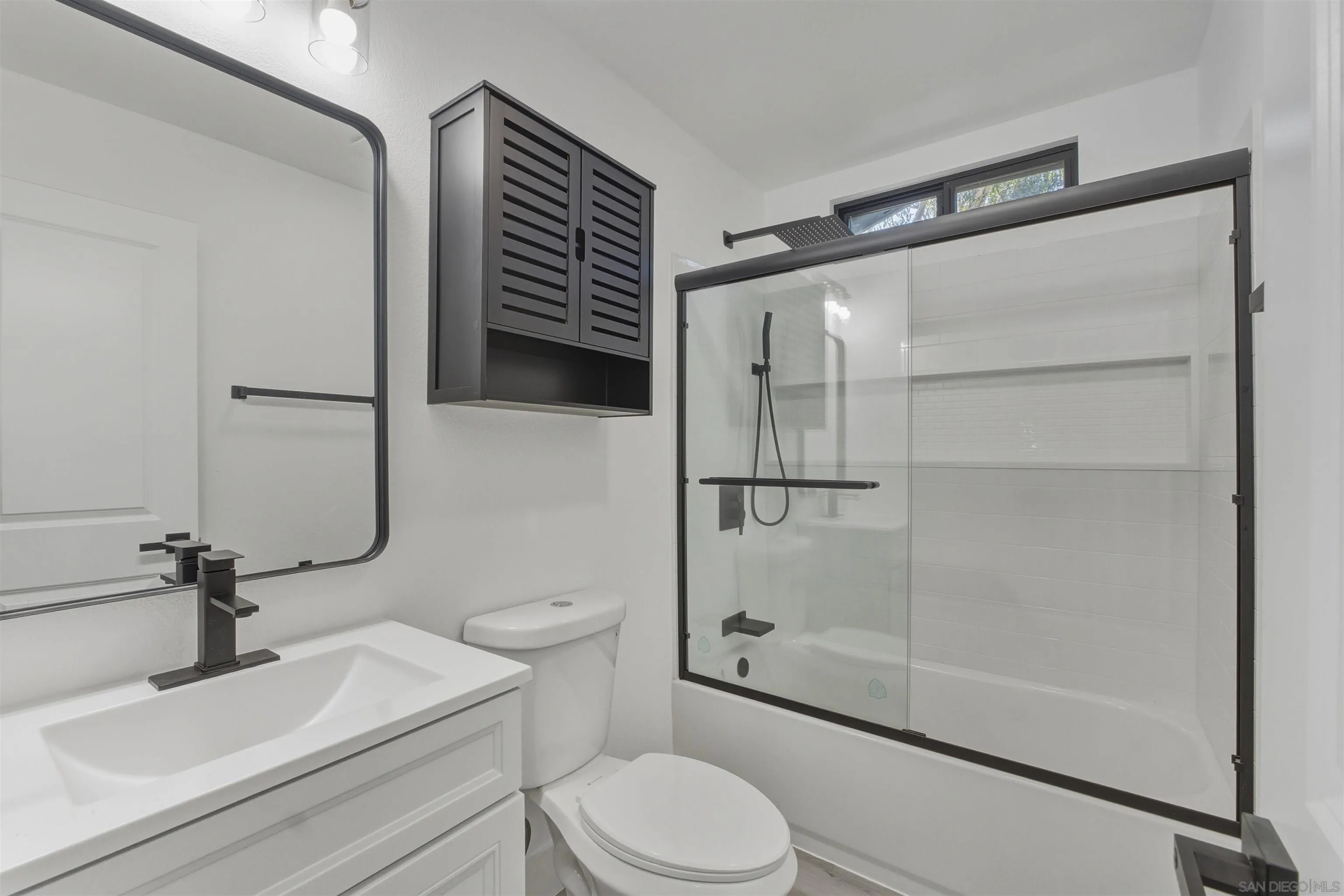 11618 Johnson Lake Road Lakeside, CA 92040 - Photo 17 of 25 a bathroom with a sink toilet and shower