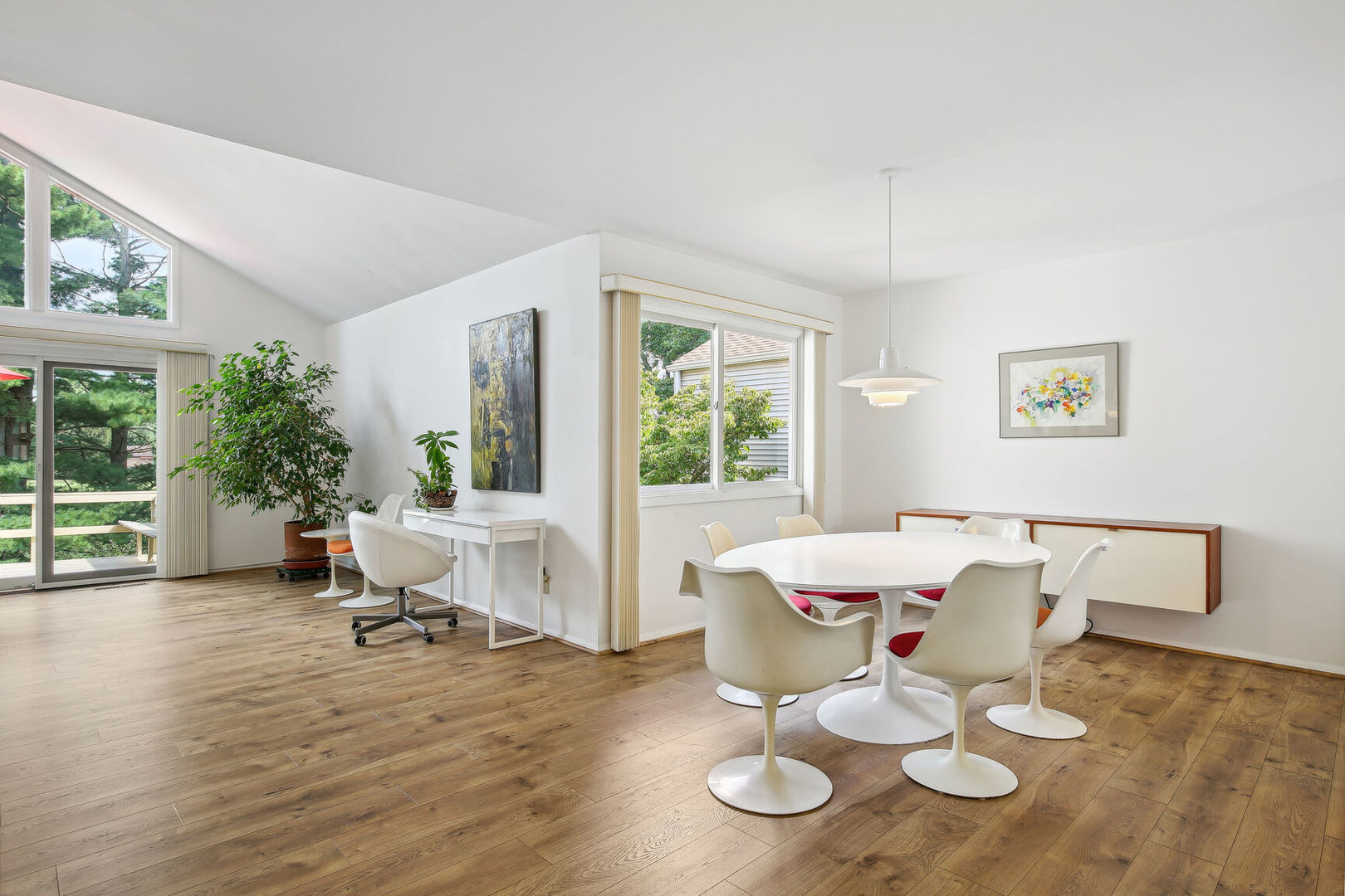 27 Fields East, Unit 27 Champaign, IL 61822 - Photo 11 of 35 a living room with furniture and floor to ceiling windows