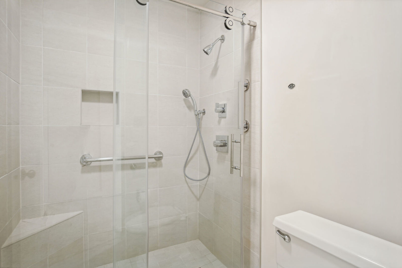 27 Fields East, Unit 27 Champaign, IL 61822 - Photo 20 of 35 a bathroom with a shower