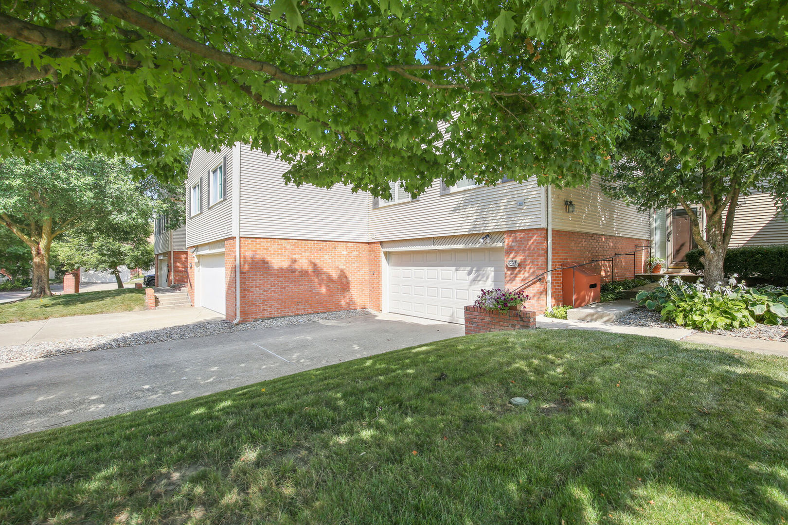 27 Fields East, Unit 27 Champaign, IL 61822 - Photo 2 of 35 a view of a backyard
