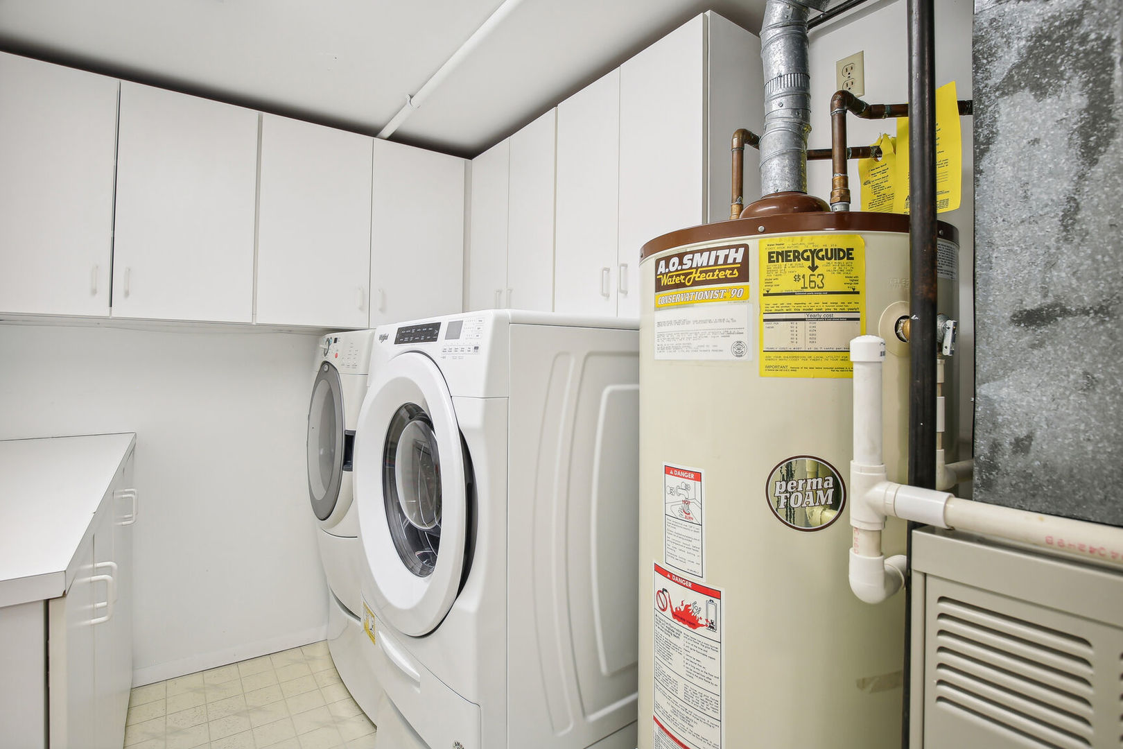 27 Fields East, Unit 27 Champaign, IL 61822 - Photo 29 of 35 a utility room with dryer and washer