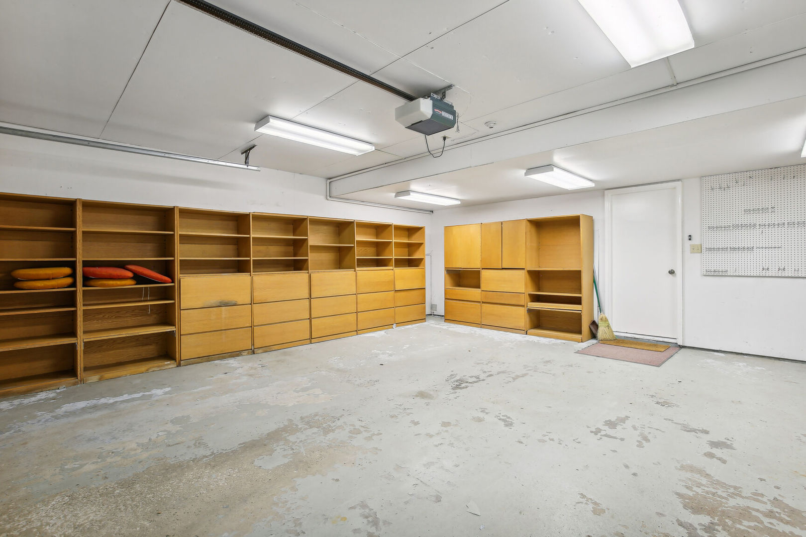 27 Fields East, Unit 27 Champaign, IL 61822 - Photo 30 of 35 a view of a room with storage and racks