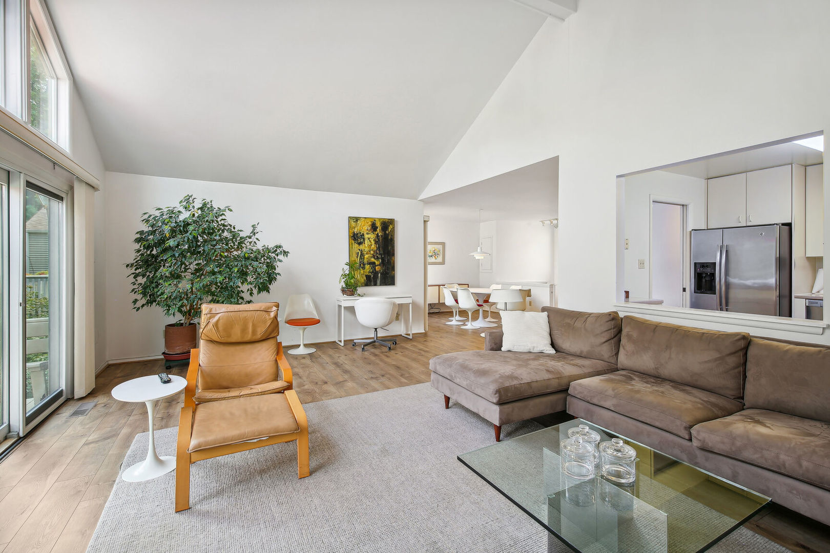 27 Fields East, Unit 27 Champaign, IL 61822 - Photo 8 of 35 a living room with furniture and a large window