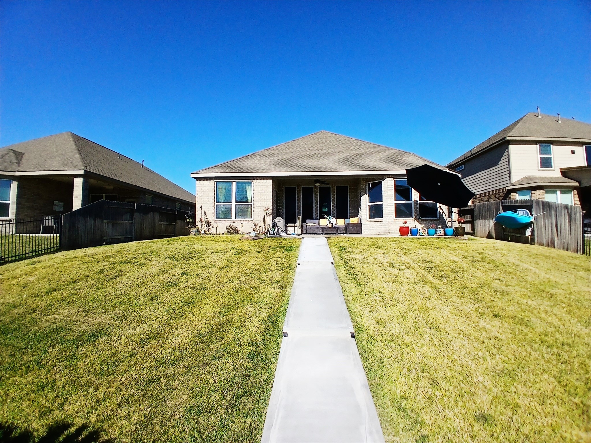 24015 Corinaldo Court Katy, TX 77493 - Photo 15 of 16 a front view of a building with street view