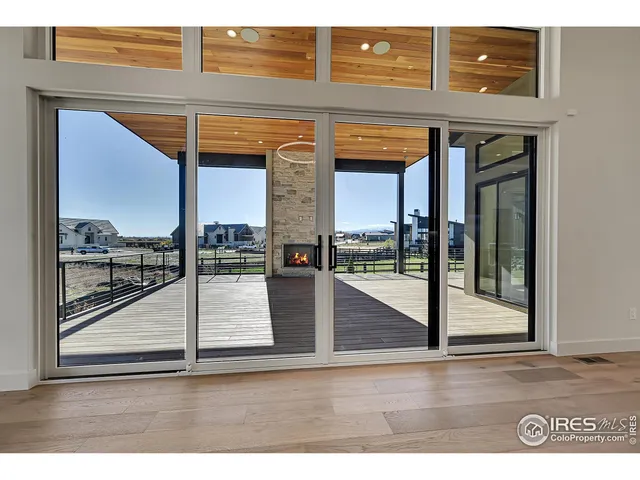 a view of a hallway with a glass door