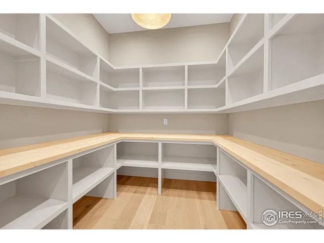 a kitchen with stainless steel appliances kitchen island granite countertop a stove a sink and a microwave