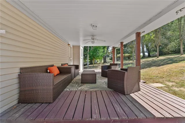 a view of a roof deck with couches