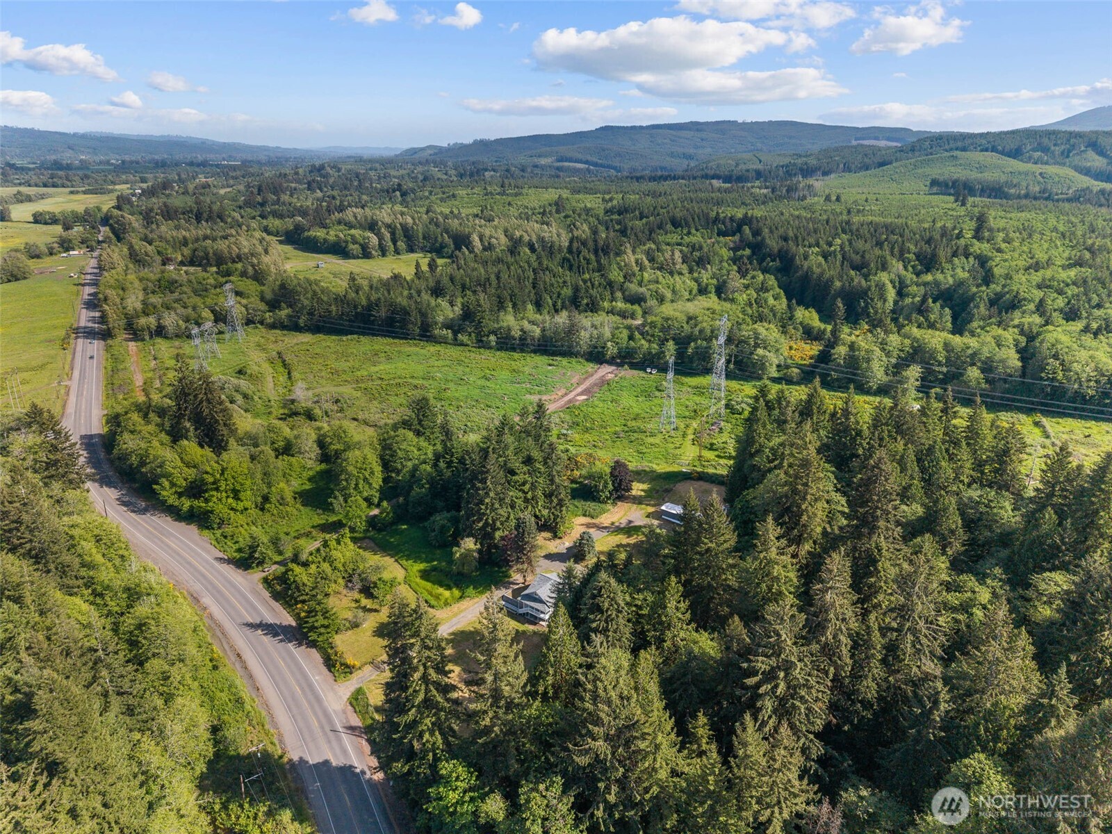 172 South Bank Road Elma, WA 98541 - Photo 38 of 40 a view of a city with lush green forest