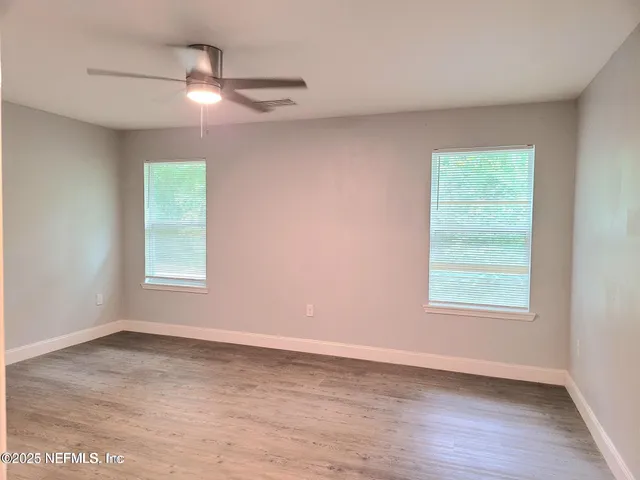 a view of an empty walk in closet