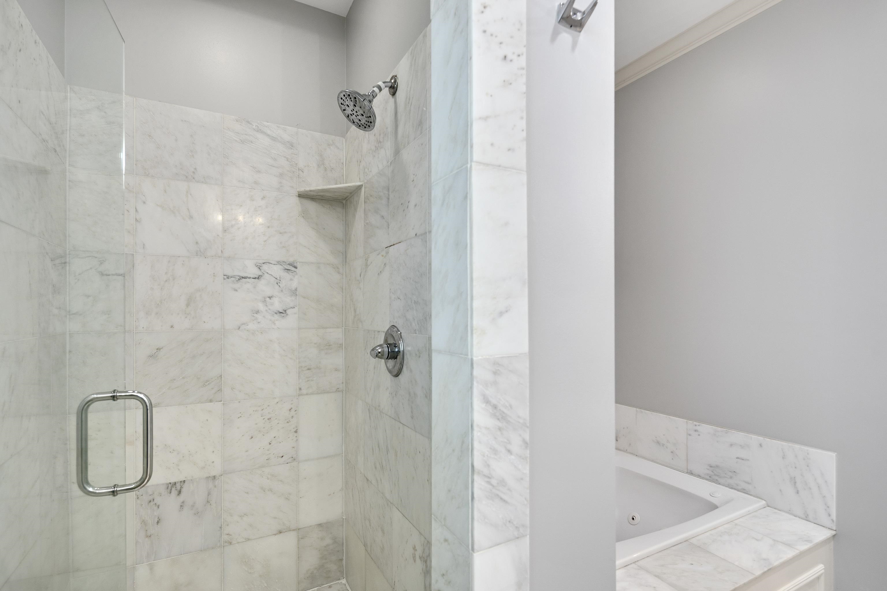 237 Windover Road Memphis, TN 38111 - Photo 26 of 37 Full bath with a shower stall, a whirlpool tub, and ornamental molding