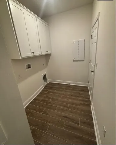 a view of a bathroom from a hallway