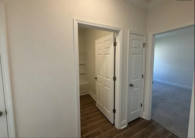 a bathroom with a sink toilet a mirror and shower