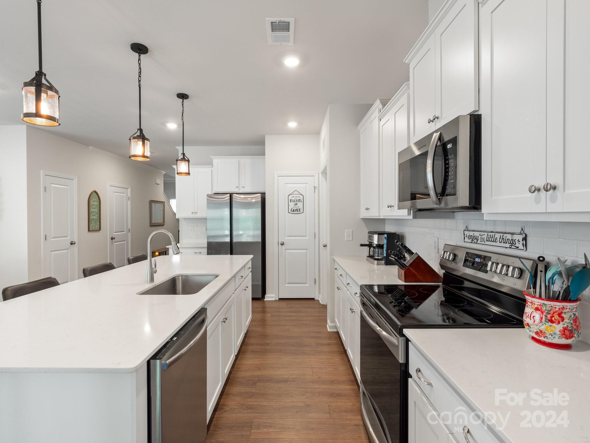 6515 Gopher Road Lancaster, SC 29720 - Photo 11 of 35 a large kitchen with stainless steel appliances lots of counter space and a sink