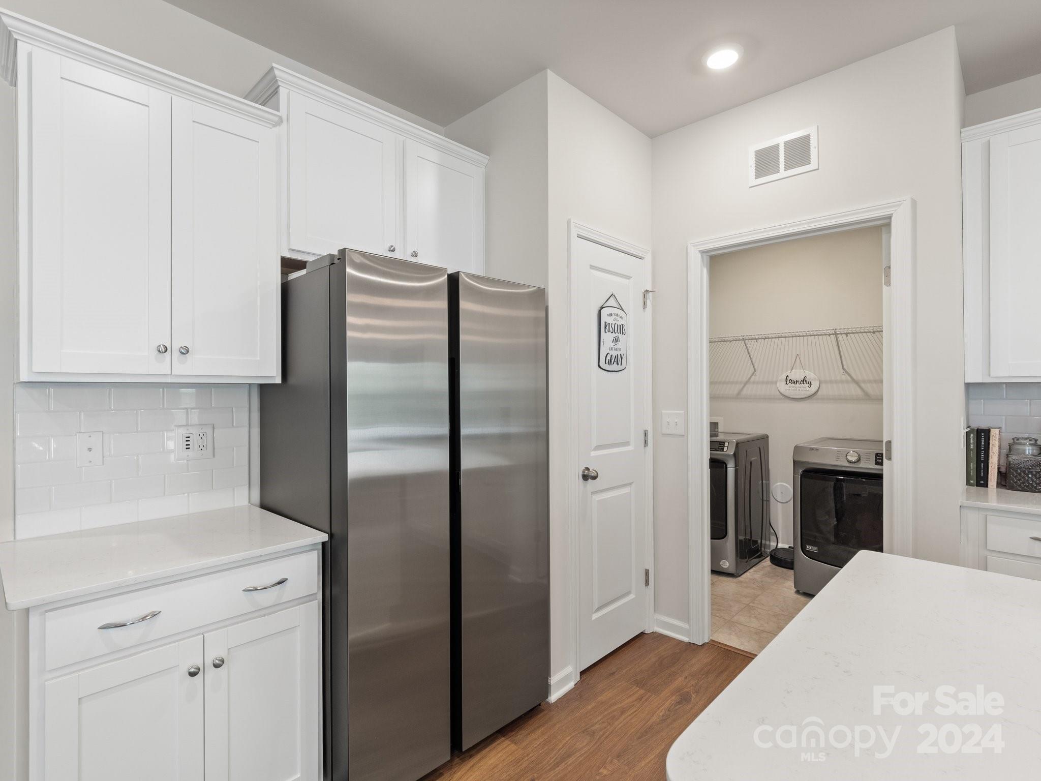6515 Gopher Road Lancaster, SC 29720 - Photo 12 of 35 a kitchen with stainless steel appliances a refrigerator sink and cabinets